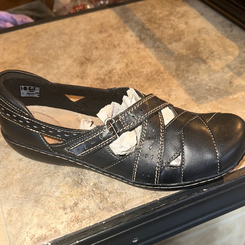 Clarks Black Leather Flats with Cutout Design